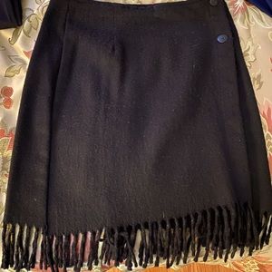 Black wool mini skirt.